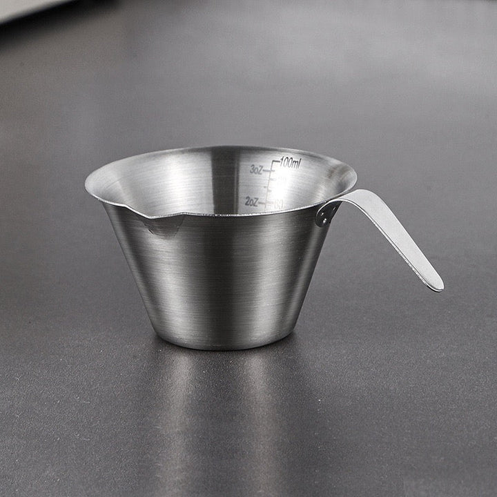 100 ml stainless steel espresso measuring cup with ounce markings and pouring spout